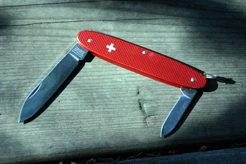 A Red 84mm Victorinox Popular.
